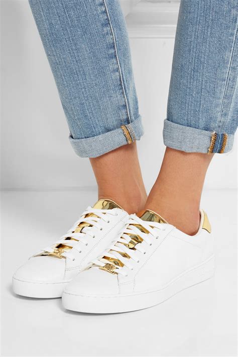 michael kors white leather sneakers.